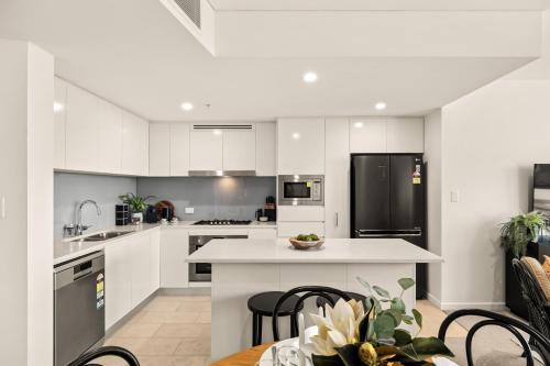 Η κουζίνα ή μικρή κουζίνα στο Brisbane luxe city living in the sky