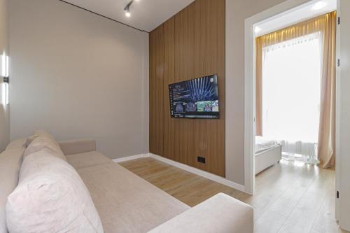 Ένα ή περισσότερα κρεβάτια σε δωμάτιο στο Apartments