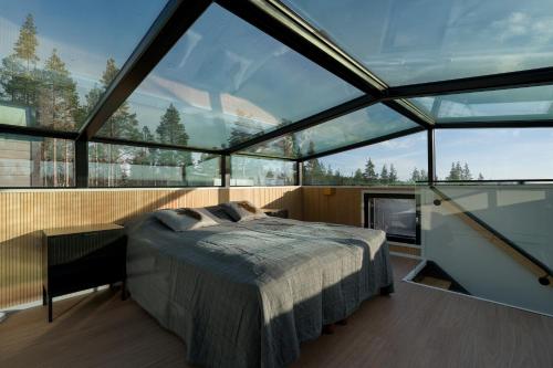 Postel nebo postele na pokoji v ubytování Aurora Paradise Levi Iglu