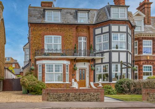 a large brick house with a front door at Rose-Fitt House in Hunstanton