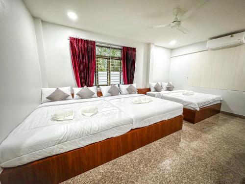 Ένα ή περισσότερα κρεβάτια σε δωμάτιο στο Vanis Pool Villa Hatyai
