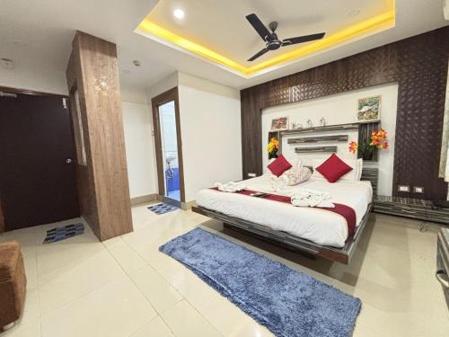 Ένα ή περισσότερα κρεβάτια σε δωμάτιο στο Hotel Arasi