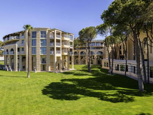 Jardin de l'établissement Rixos Park Belek - The Land Of Legends Access