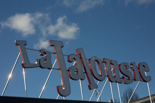 a large sign for the google logo on top of a building at La Jalousie in Saint-Aignan-de-Cramesnil