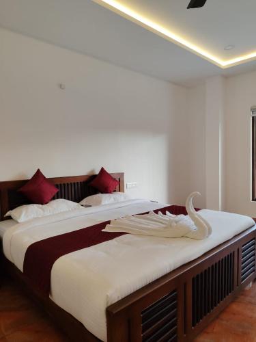 Postel nebo postele na pokoji v ubytování SN Homes