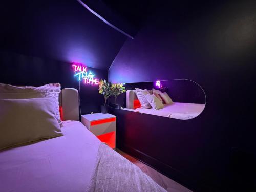 En eller flere senge i et værelse på Velvet room balneo