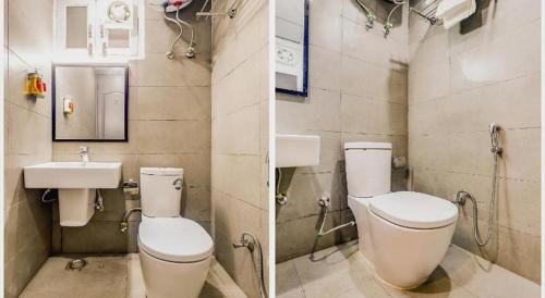 ニューデリーにあるGolden World Hotelのトイレと洗面台のあるバスルーム