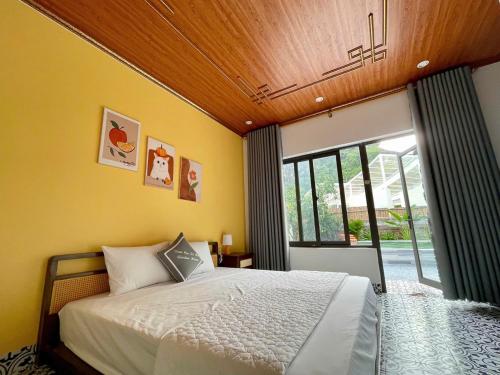 Postel nebo postele na pokoji v ubytování Tam Coc Harmony Homestay