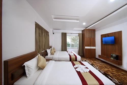 Postel nebo postele na pokoji v ubytování Family Apartment