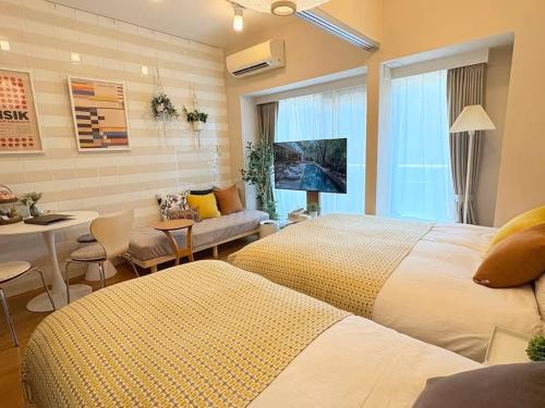 Katil atau katil-katil dalam bilik di simasima-stayサン203 高松駅徒歩5分