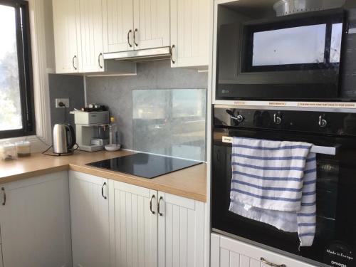 Kuchyň nebo kuchyňský kout v ubytování Maria Wheeler