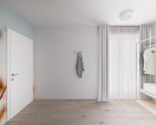 Φωτογραφία από το άλμπουμ του Fairschlafen Boutique Hostel Zimmer 1-06 mit Balkon σε Roge