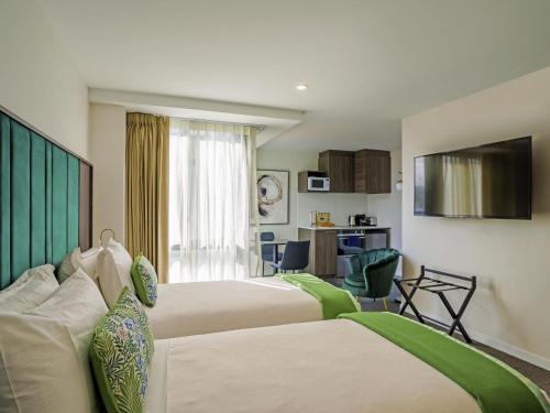 Una cama o camas en una habitación de The Sebel Wellington Thorndon