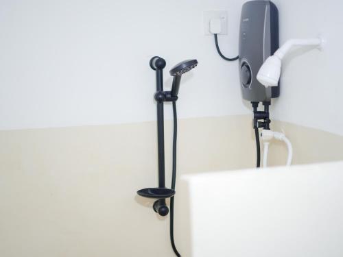 a hair dryer and a phone in a wall at Galle Serenity Bliss Private Villa in Galle