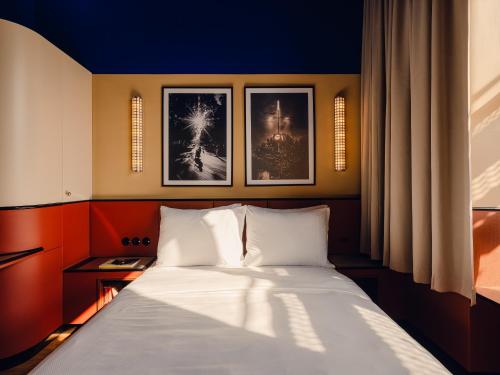 Ένα ή περισσότερα κρεβάτια σε δωμάτιο στο The Companion Vienna l Opening Spring 2026