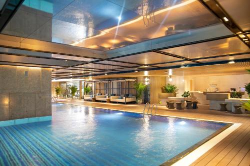 Bazén v ubytování TMS Quy Nhơn - Hupasearest Apartment SeaView nebo v jeho okolí