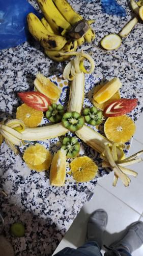 a bunch of fruits and vegetables on a table at Aka luxury camp in Merzouga