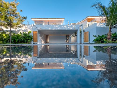 an image of a villa with a swimming pool at The Trinity new modern 5BR villa with 20M Pool in Thalang
