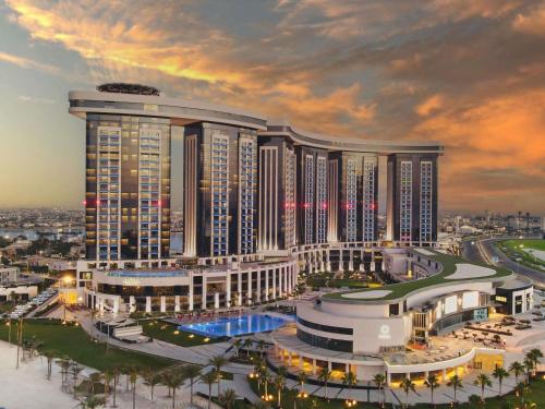 a rendering of a large building in a city at Rixos Premium Alamein in El Alamein