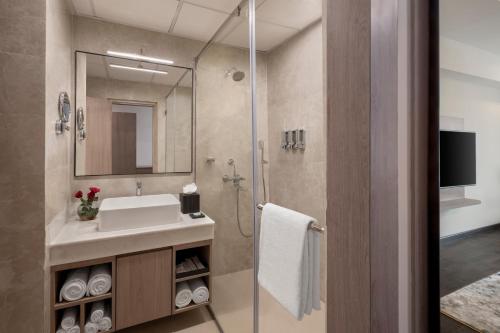 Phòng tắm tại Welcomhotel By ITC Hotels Bodh Gaya Hotel & Convention Centre