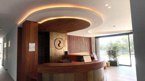 an office lobby with a circular ceiling at Pure Sea Apartments Villajoyosa in Villajoyosa