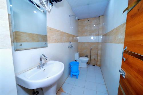 Ένα μπάνιο στο Hotel Sky inn Agra