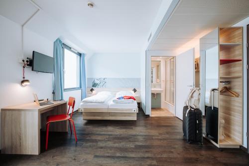 Katil atau katil-katil dalam bilik di MEININGER Hotel Wien Downtown Franz