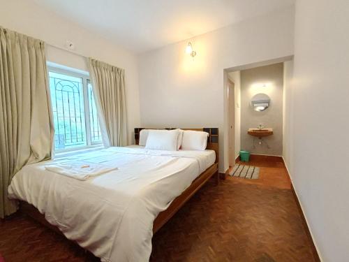 Ένα ή περισσότερα κρεβάτια σε δωμάτιο στο Meadows Mountain Villa