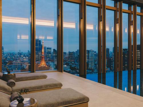 a living room with a view of the eiffel tower at Fairmont Tokyo in Tokyo