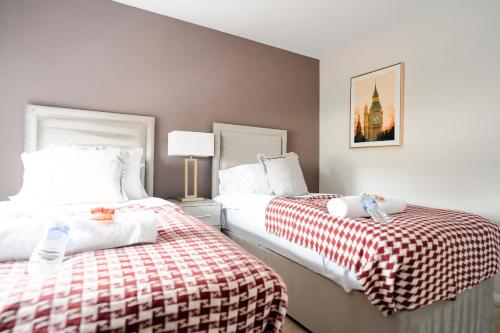 Postel nebo postele na pokoji v ubytování 4 BDR House By Caledonia Luxe Stays Short Lets & Serviced Accommodation Livingston