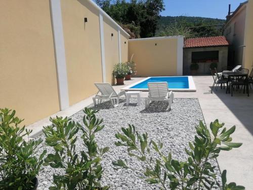 Πισίνα στο ή κοντά στο Gesamte Wohnung Mit Terrasse Und Meerblick