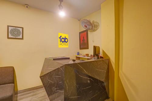 a living room with a large marble counter in a room at Via Together Stays in Rānchī