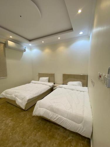 Postel nebo postele na pokoji v ubytování دور مستقل مع حوش ومجلس خارجي