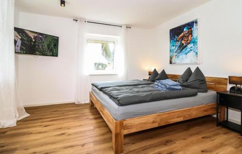 a bedroom with a bed in a room at Apartment in Inzing in Inzing