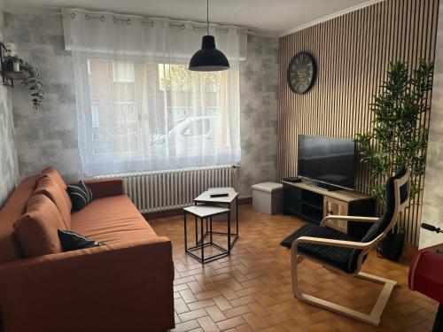 Posezení v ubytování Maison 3 chambres à Lambres Lez Douai