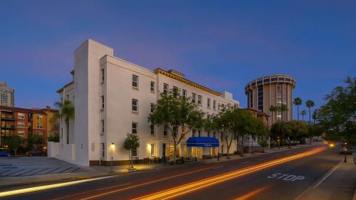 a white building on a city street at night at Motel 6-San Diego, CA - Downtown in San Diego