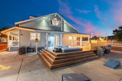 a house with a large deck with a mattress at The Cowboy Social Unit 3 in Williams