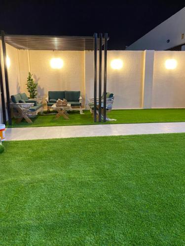Jardín al aire libre en شالية همس الفاخرة