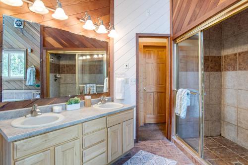 a bathroom with two sinks and a shower at Mtn-View Deck Stunning Fraser Home By Ski Shuttle in Maryvale