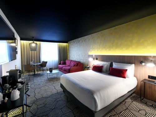 Ένα ή περισσότερα κρεβάτια σε δωμάτιο στο Mercure Arras Centre Gare