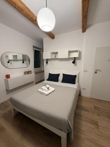 a bedroom with a large bed in a room at Le Casette in Macerata
