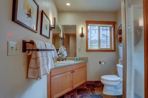 a bathroom with a sink and a toilet at Three Rivers 30 day minimum in Hood River