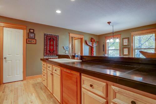 a kitchen with a counter top and a sink at Wanderlust in Hood River