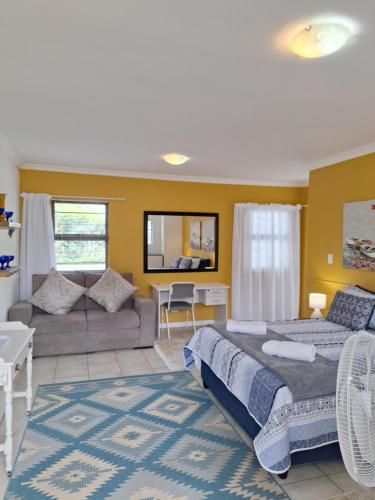 Postel nebo postele na pokoji v ubytování The Hilton Stay Cottages