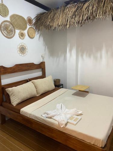 Tarhata Homestay - Whole House - 3 Beds - 2 Baths - 10 paxにあるベッド