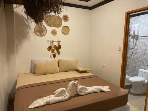 Tarhata Homestay - Whole House - 3 Beds - 2 Baths - 10 paxにあるベッド