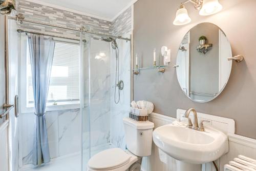 a bathroom with a toilet and a sink and a shower at 2 Mi to Mohegan Sun and Dtwn Home in Norwich in Norwich