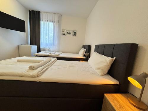 Llit o llits en una habitació de Orex Hotel