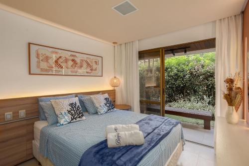 Giường trong phòng chung tại Nannai Residence - Muro Alto - Porto de Galinhas