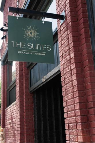 a sign on the side of a brick building at The Suites of Lava Hot Springs in Lava Hot Springs